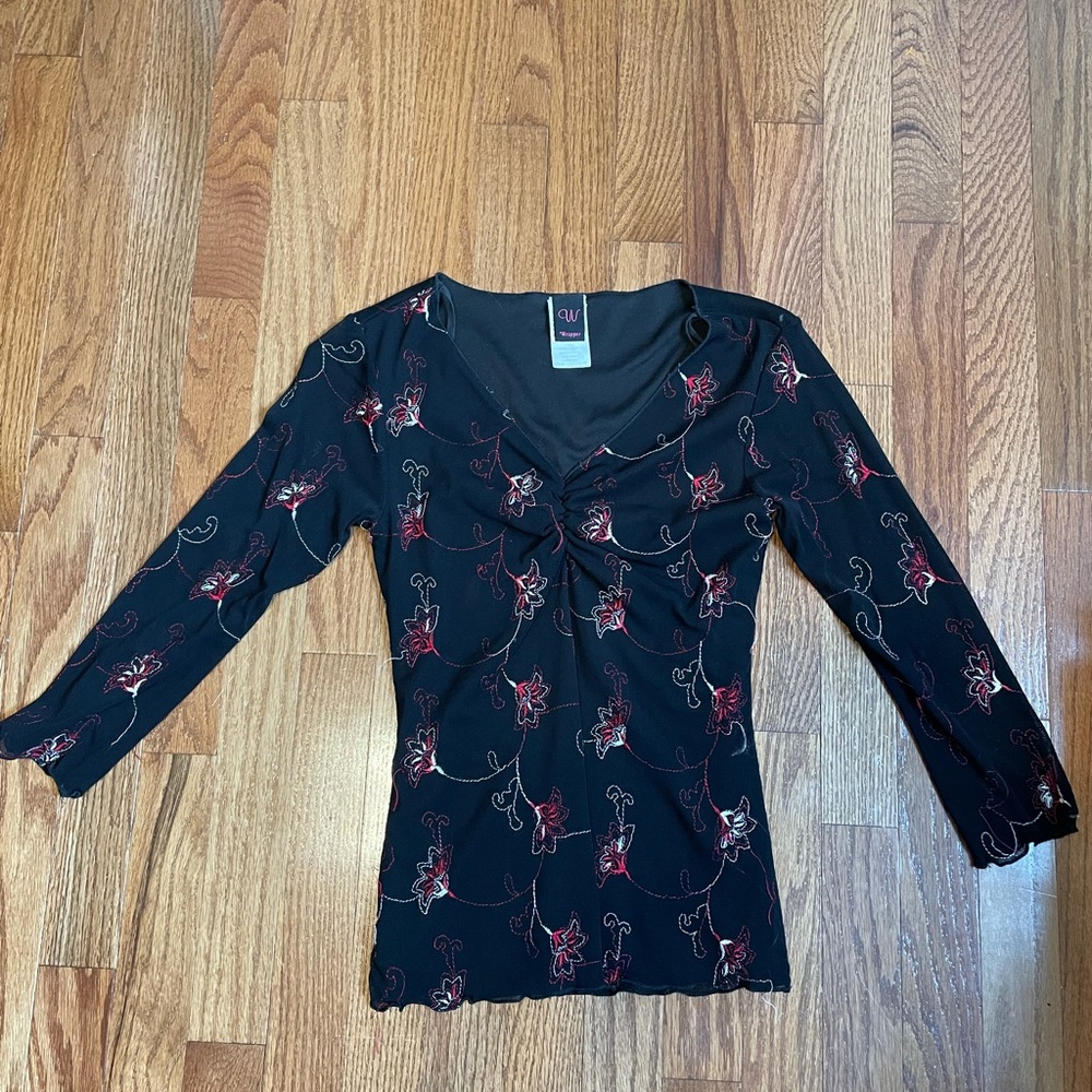 Long sleeved shirt with a v-neck